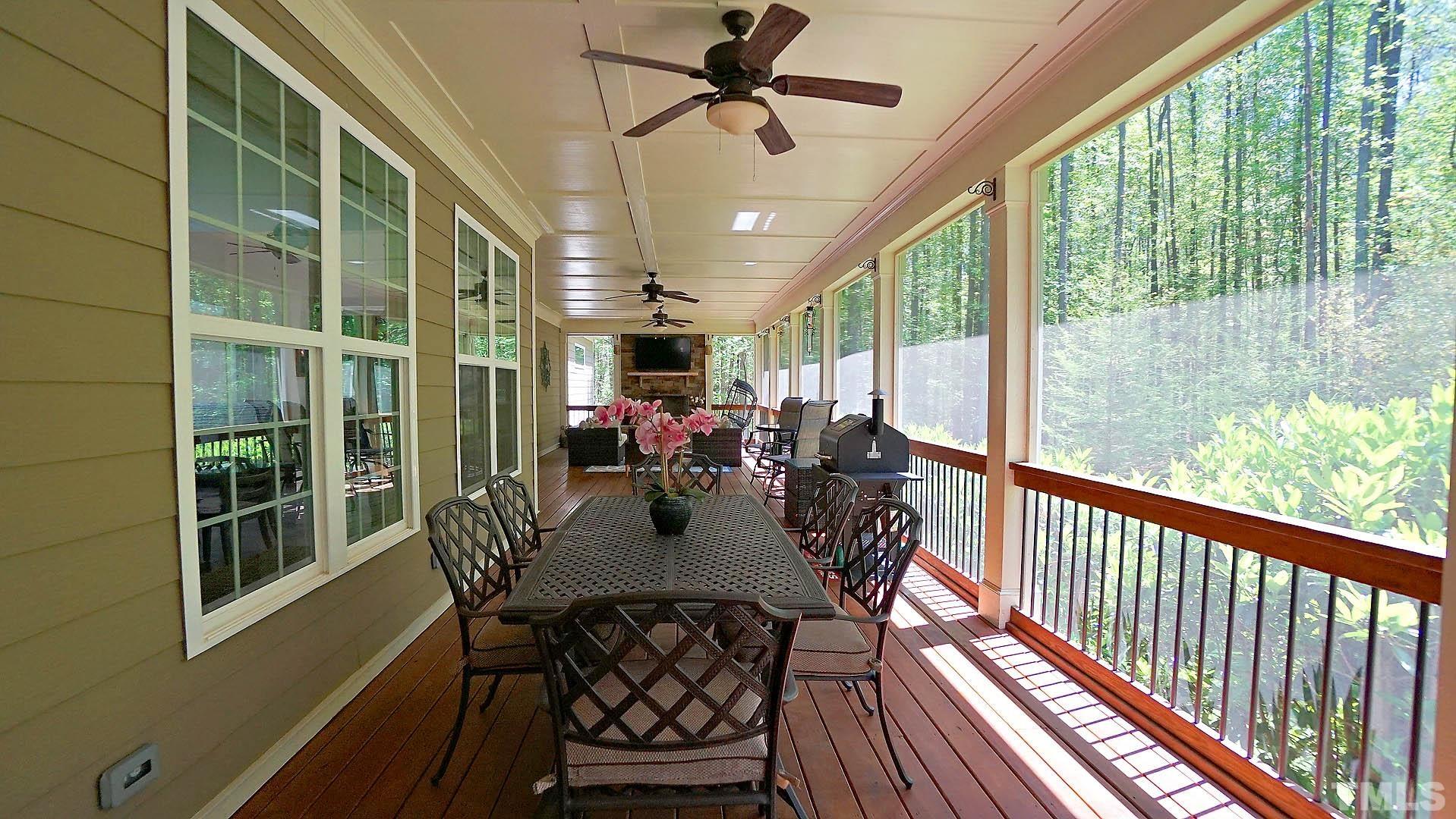 275 Hawfields Drive Pittsboro, NC 27312 - Photo 6 of 44 a view of a dining room with furniture window and outside view