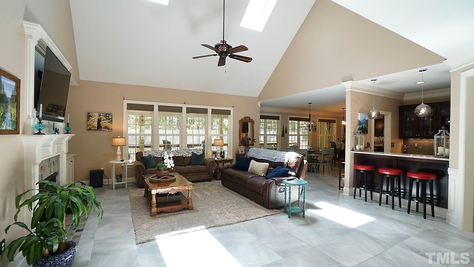 275 Hawfields Drive Pittsboro, NC 27312 - Photo 8 of 44 a living room with furniture and a large window