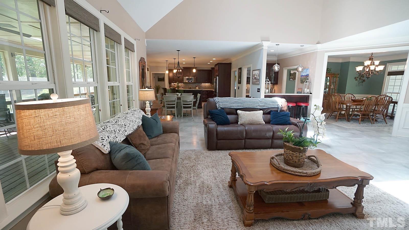 275 Hawfields Drive Pittsboro, NC 27312 - Photo 44 of 44 a living room with furniture and a large window