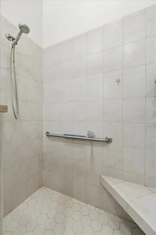 a white toilet sitting next to a bathroom sink