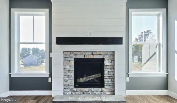 a living room with a fireplace