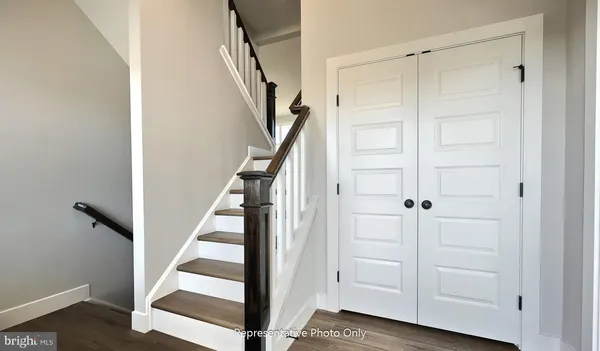 a view of staircase with white walls and white walls