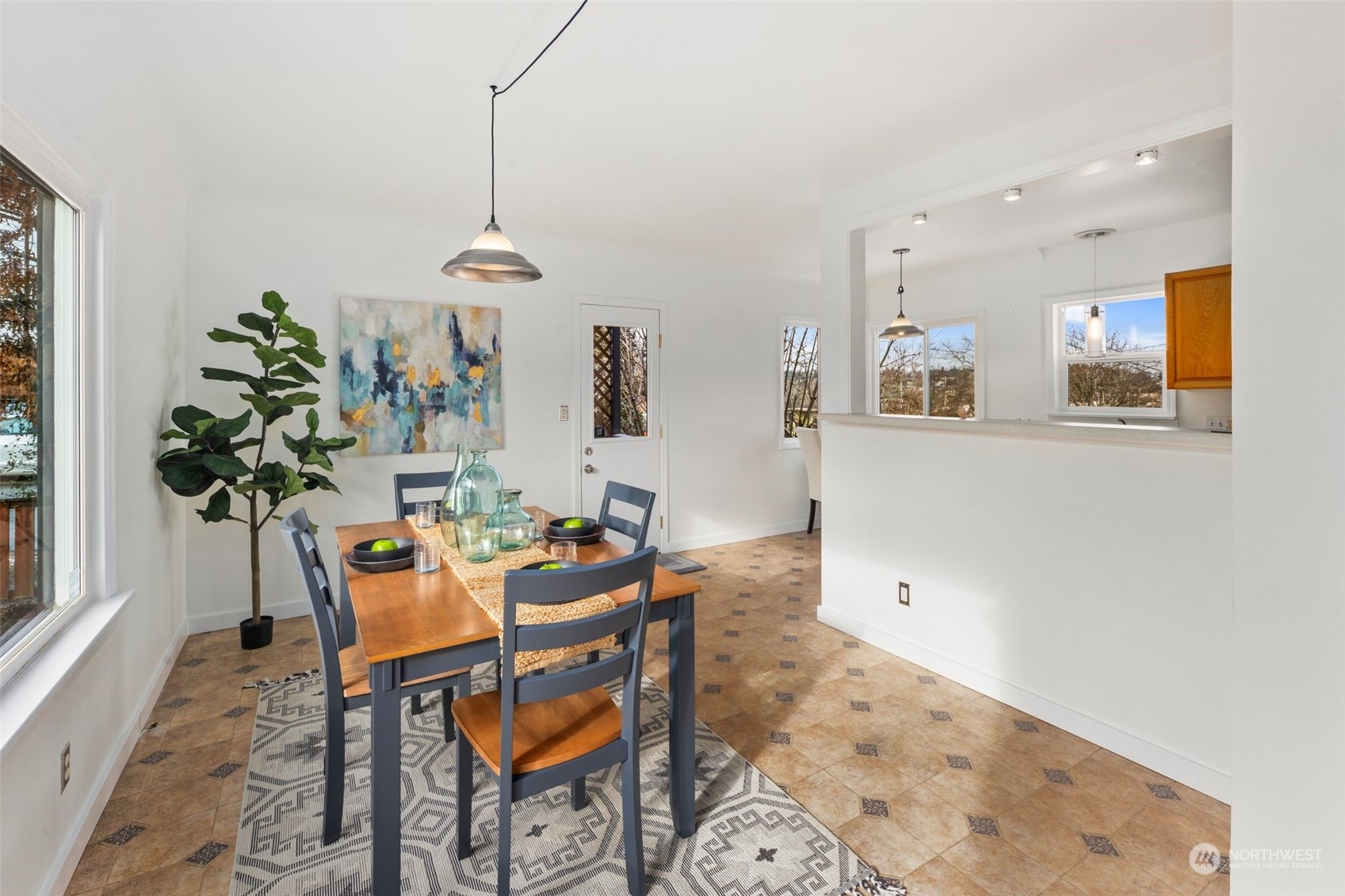506 South 15th Street Renton, WA 98055 - Photo 8 of 28 a dining room with furniture and window