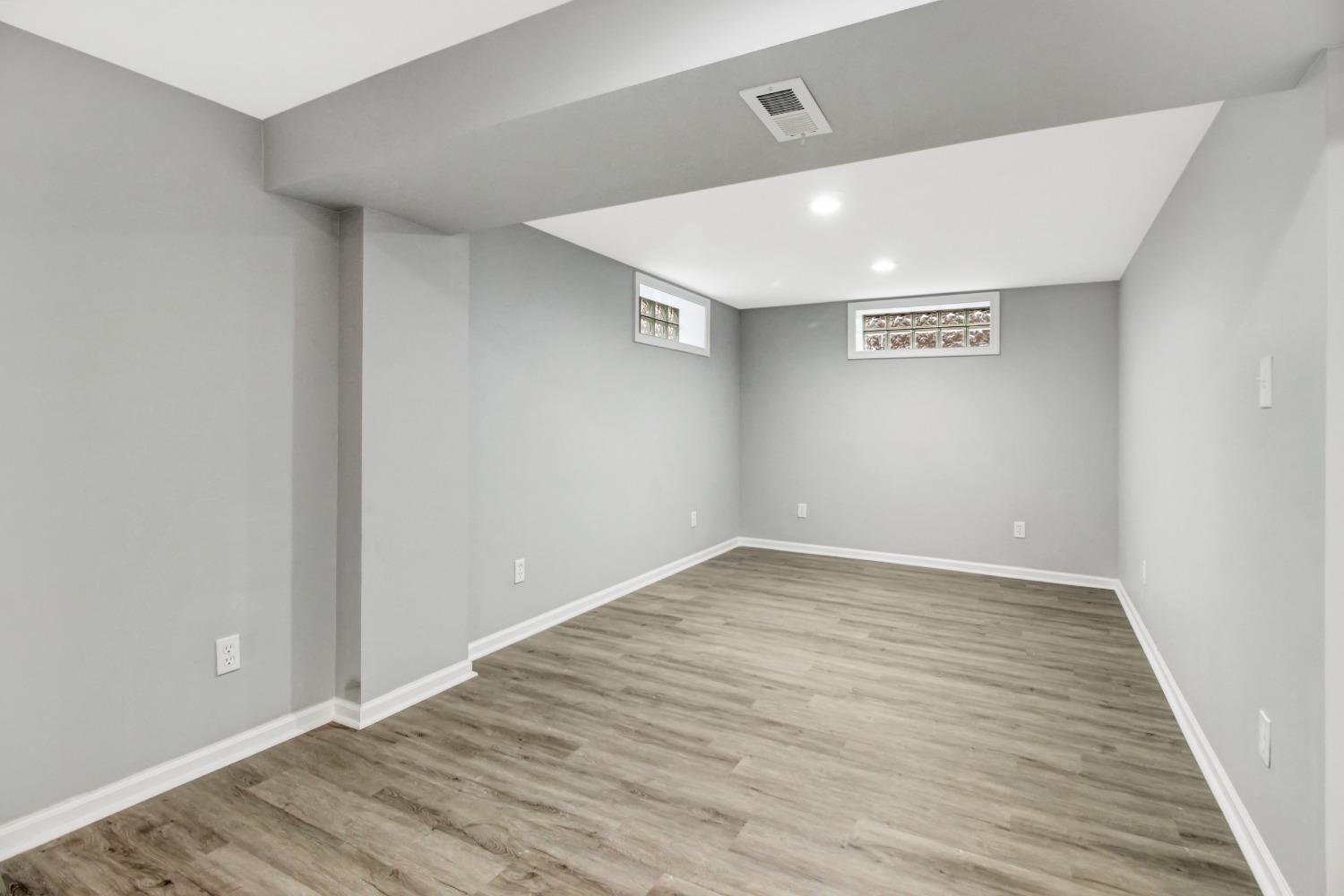 905 East Ridge Road Gary, IN 46409 - Photo 12 of 15 a view of an empty room with wooden floor
