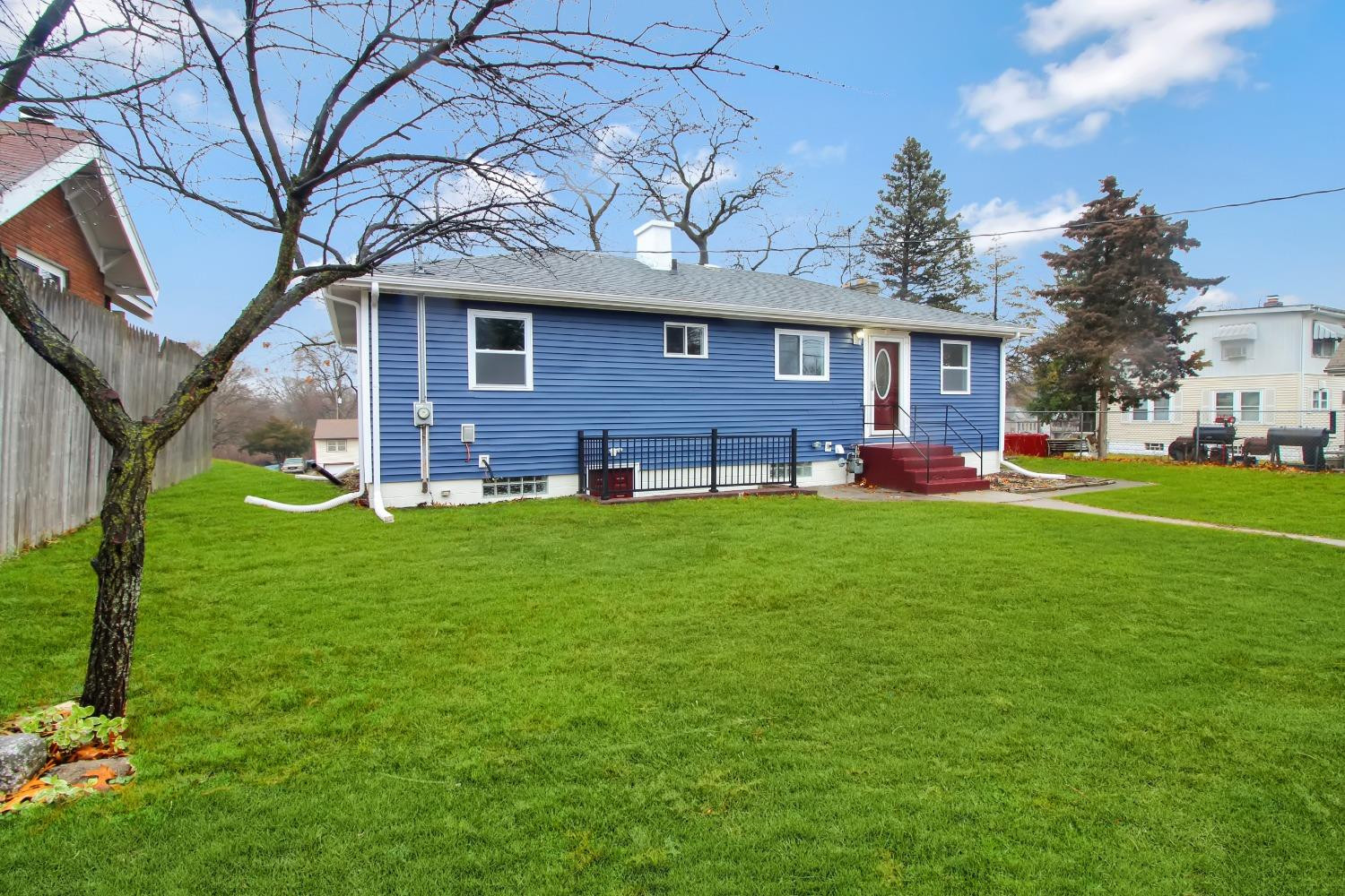 905 East Ridge Road Gary, IN 46409 - Photo 15 of 15 a view of a house with a yard porch and sitting area