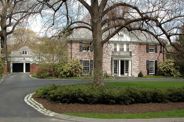 47 Carisbrooke Road Wellesley, MA 02481 - Photo 1 of 24 a front view of a house with a garden