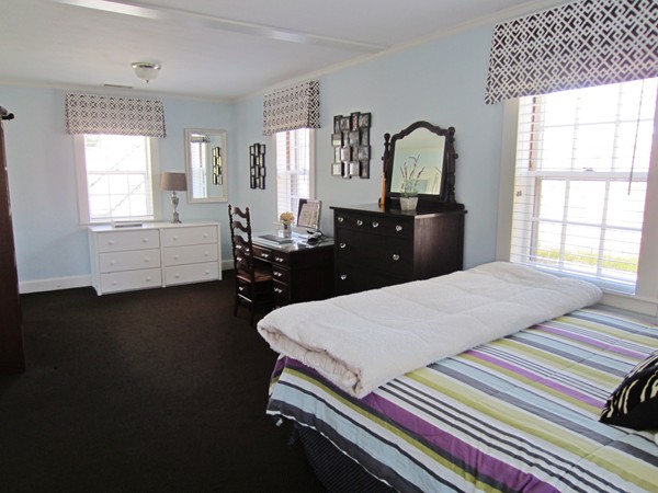 47 Carisbrooke Road Wellesley, MA 02481 - Photo 18 of 24 a bed room with a bed mirror and window