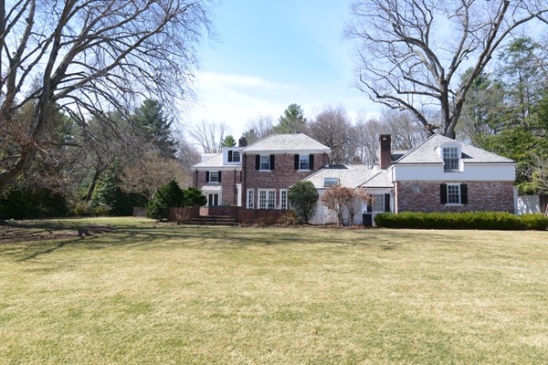 47 Carisbrooke Road Wellesley, MA 02481 - Photo 23 of 24 a front view of a house with a yard