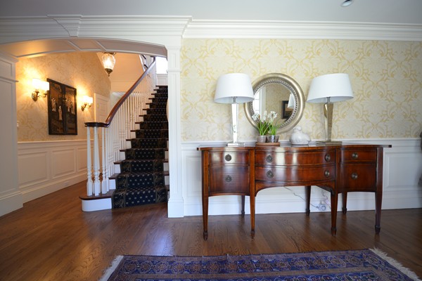 47 Carisbrooke Road Wellesley, MA 02481 - Photo 3 of 24 a living room with wooden floor furniture and entryway
