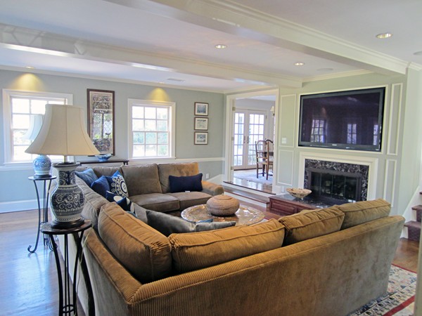 47 Carisbrooke Road Wellesley, MA 02481 - Photo 10 of 24 a living room with furniture and a fireplace