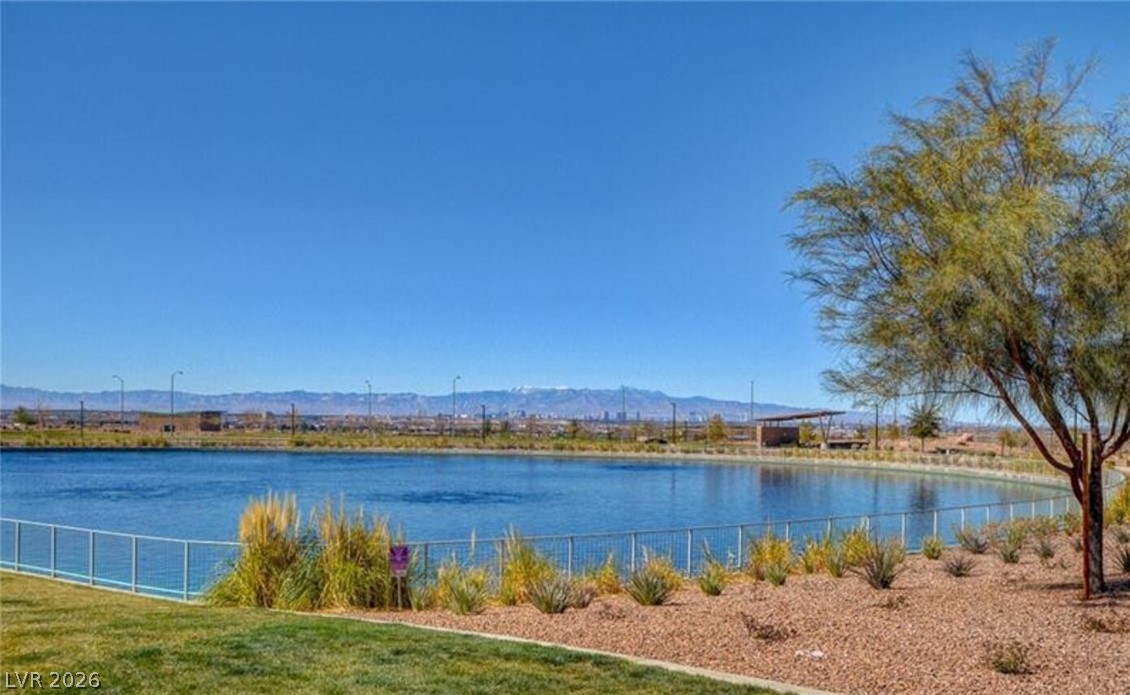 1100 East Sunset Road Henderson, NV 89011 - Photo 51 of 63 Sweeping water vistas sit framed by distant mountain ranges under clear desert skies.