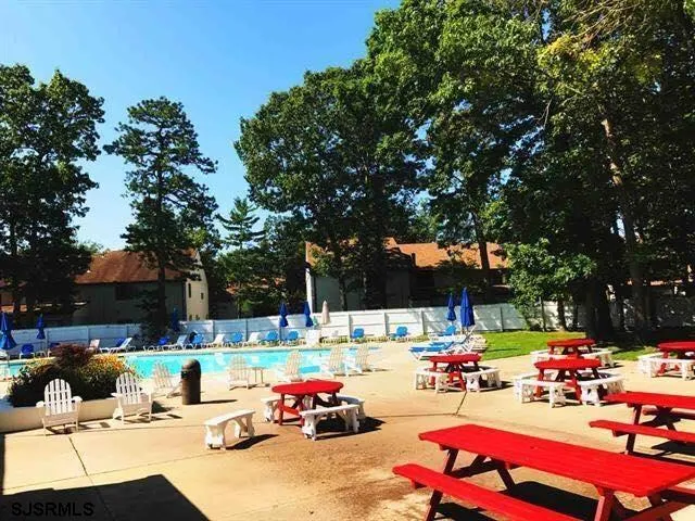 a group of cars parked in a parking lot