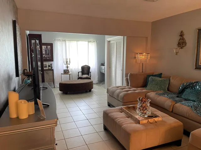 a living room with furniture and a couch