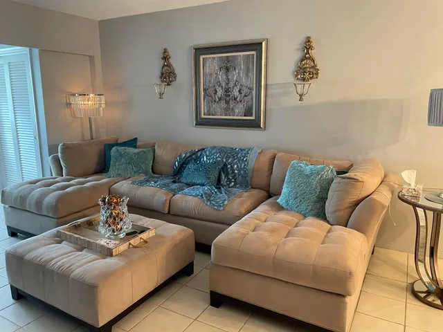 a living room with furniture and a couch