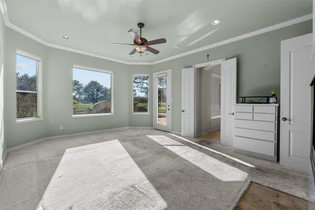 a kitchen with stainless steel appliances granite countertop a stove a sink a refrigerator and a cabinets