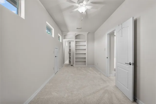 a view of a back yard from a balcony