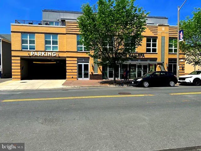 a view of a building with a street