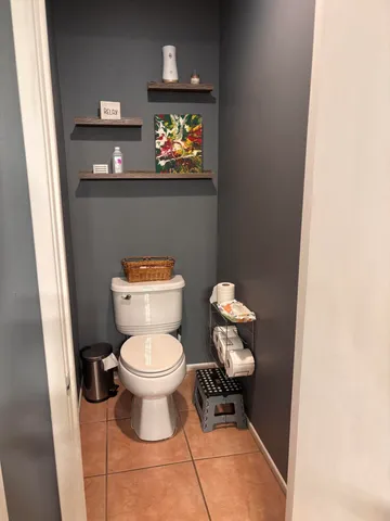 a bathroom with a toilet and a sink