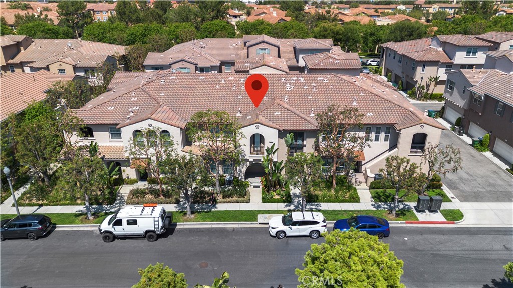 75 Reunion Irvine, CA 92603 - Photo 2 of 10 a view of multiple houses with a street