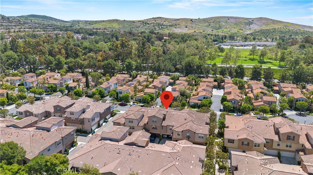 75 Reunion Irvine, CA 92603 - Photo 3 of 10 an aerial view of a city with lots of residential buildings