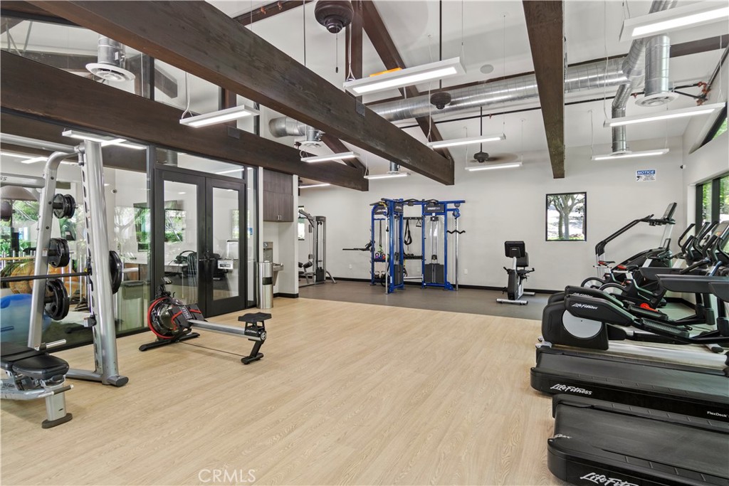 75 Reunion Irvine, CA 92603 - Photo 6 of 10 a view of a room with gym equipment