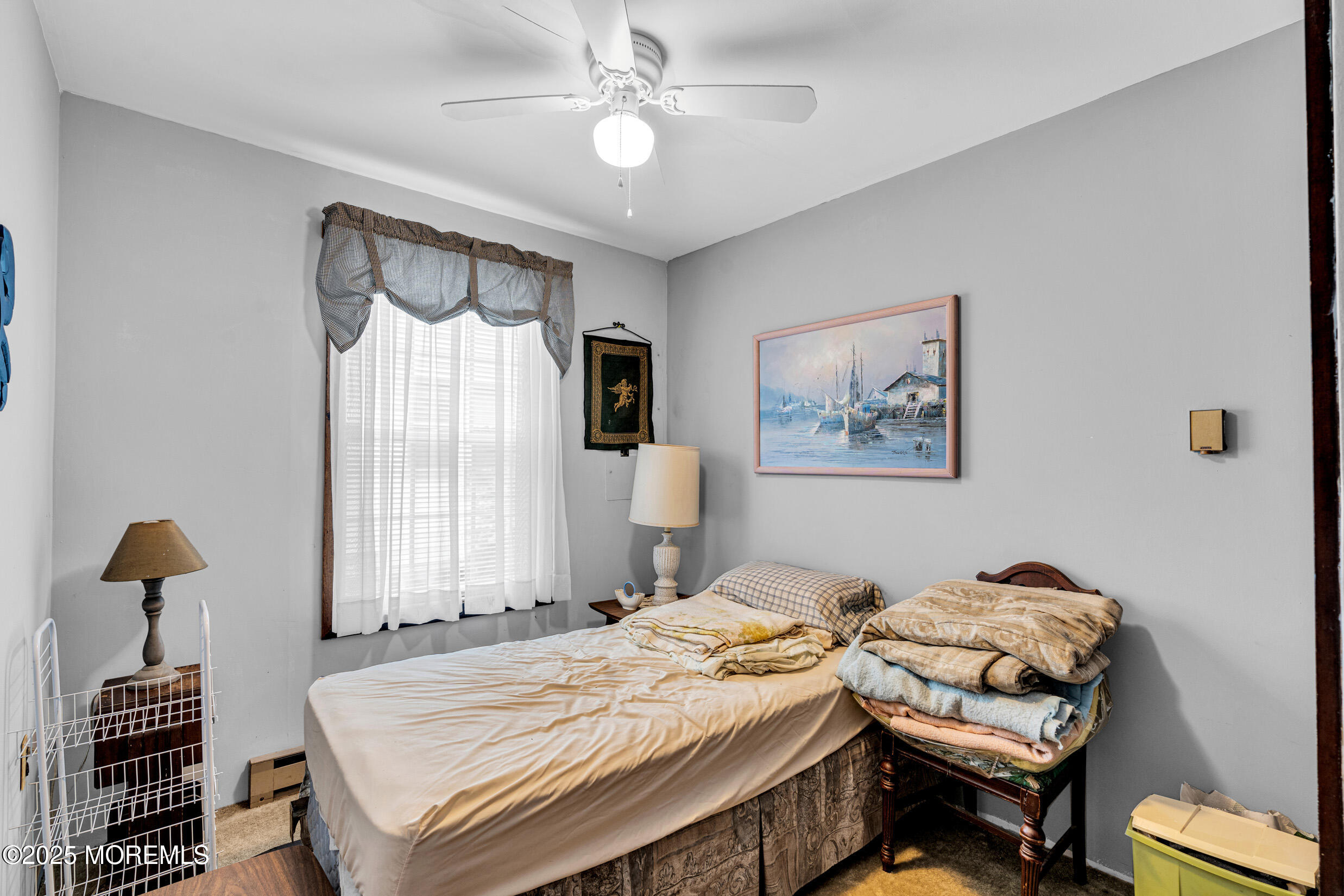 119 George Road Toms River, NJ 08753 - Photo 21 of 29 a bedroom with a bed and a chandelier