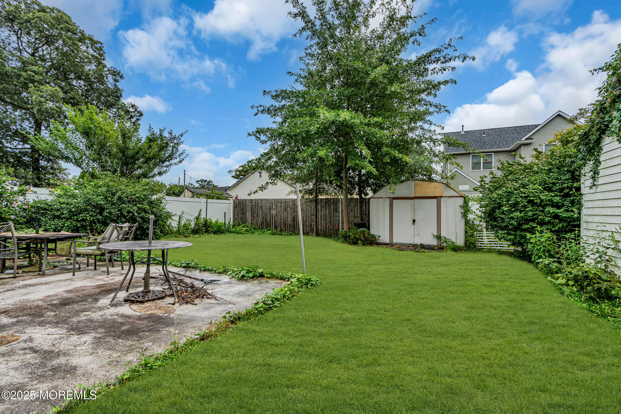119 George Road Toms River, NJ 08753 - Photo 25 of 29 a view of a chair and table in backyard of the house
