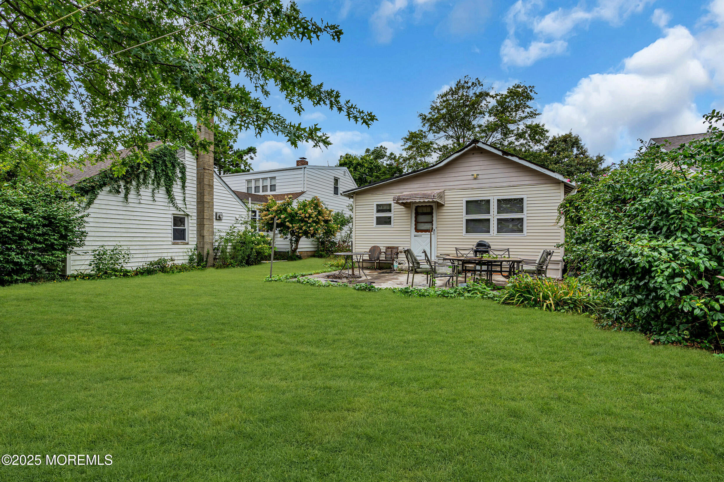 119 George Road Toms River, NJ 08753 - Photo 27 of 29 a front view of house with yard and green space