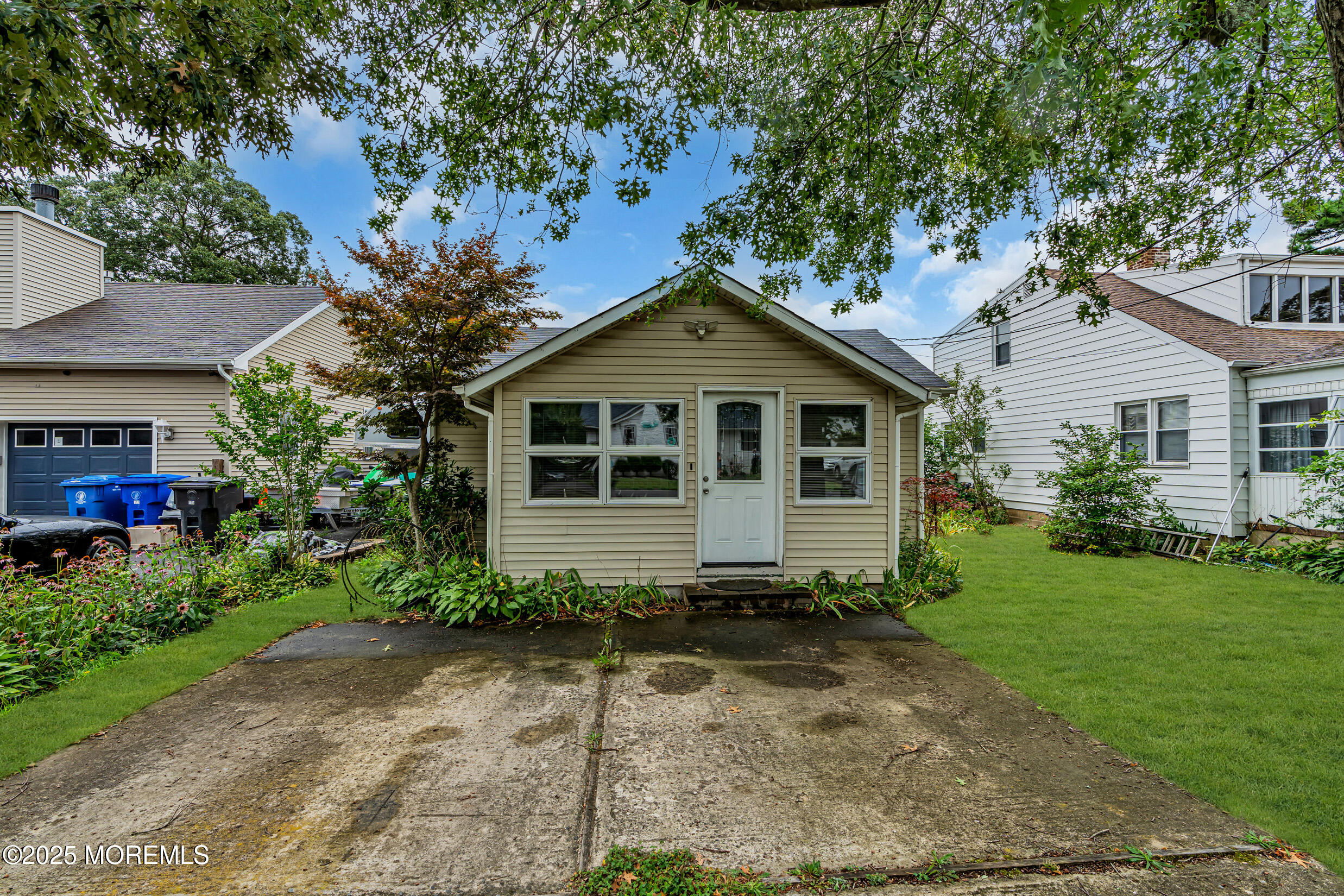 119 George Road Toms River, NJ 08753 - Photo 3 of 29 a front view of a house with a yard