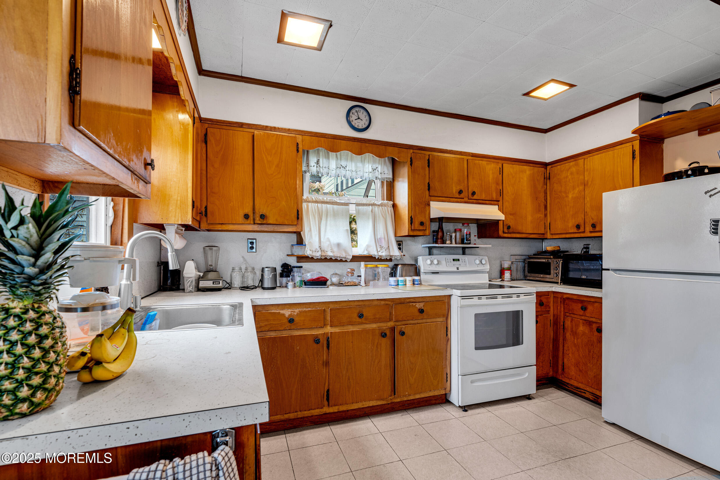 119 George Road Toms River, NJ 08753 - Photo 10 of 29 a kitchen that has a sink and a refrigerator