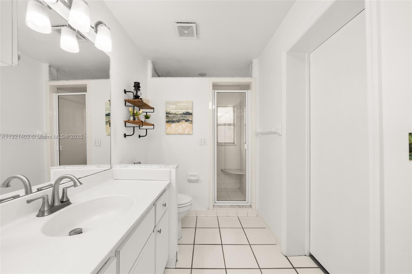 2551 Lakeview Drive Sebring, FL 33870 - Photo 37 of 73 a bathroom with a sink toilet and shower