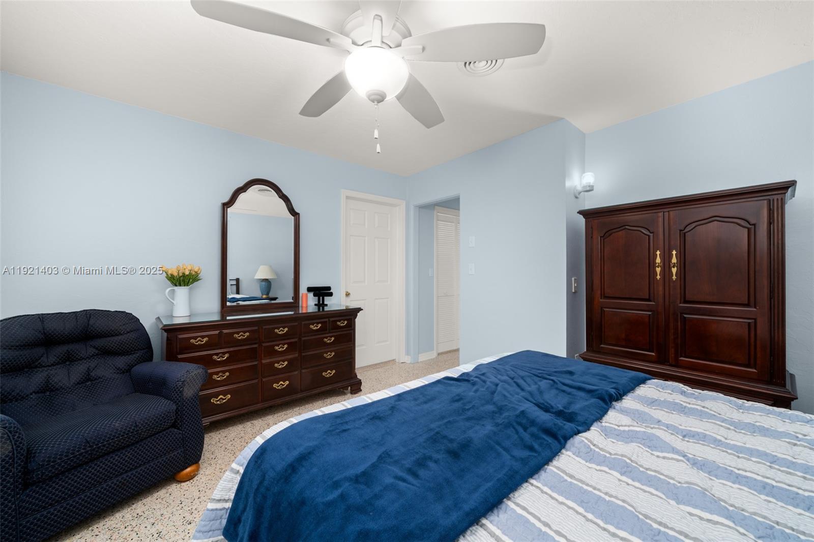 2551 Lakeview Drive Sebring, FL 33870 - Photo 54 of 73 a bedroom with a bed and a dresser