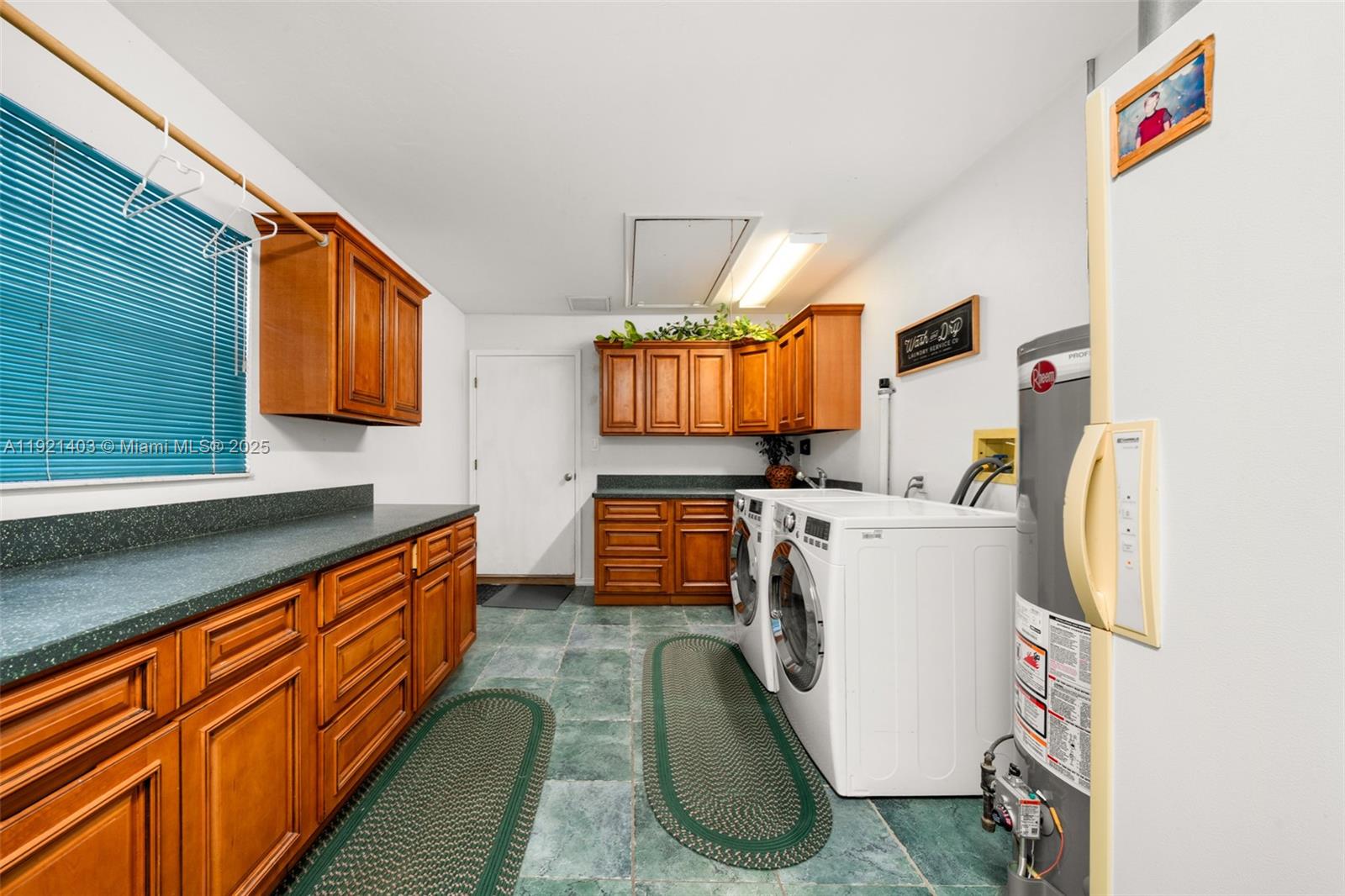 2551 Lakeview Drive Sebring, FL 33870 - Photo 61 of 73 a utility room with dryer and washer