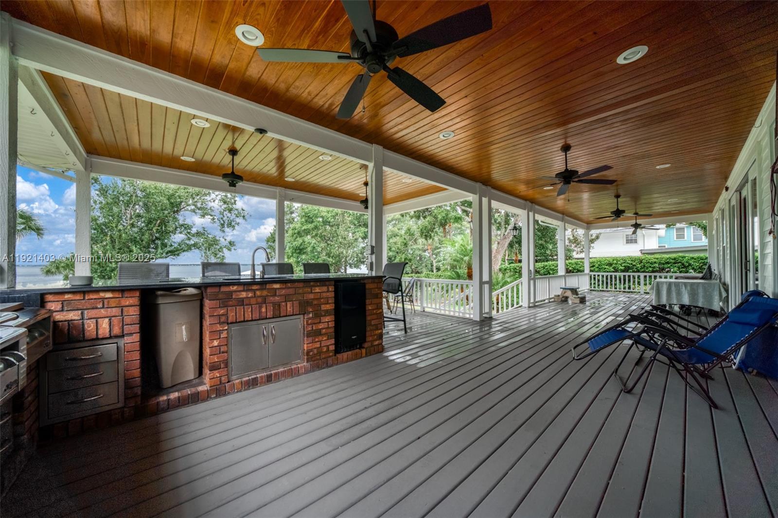 2551 Lakeview Drive Sebring, FL 33870 - Photo 64 of 73 a view of outdoor space with wooden floor and outdoor seating
