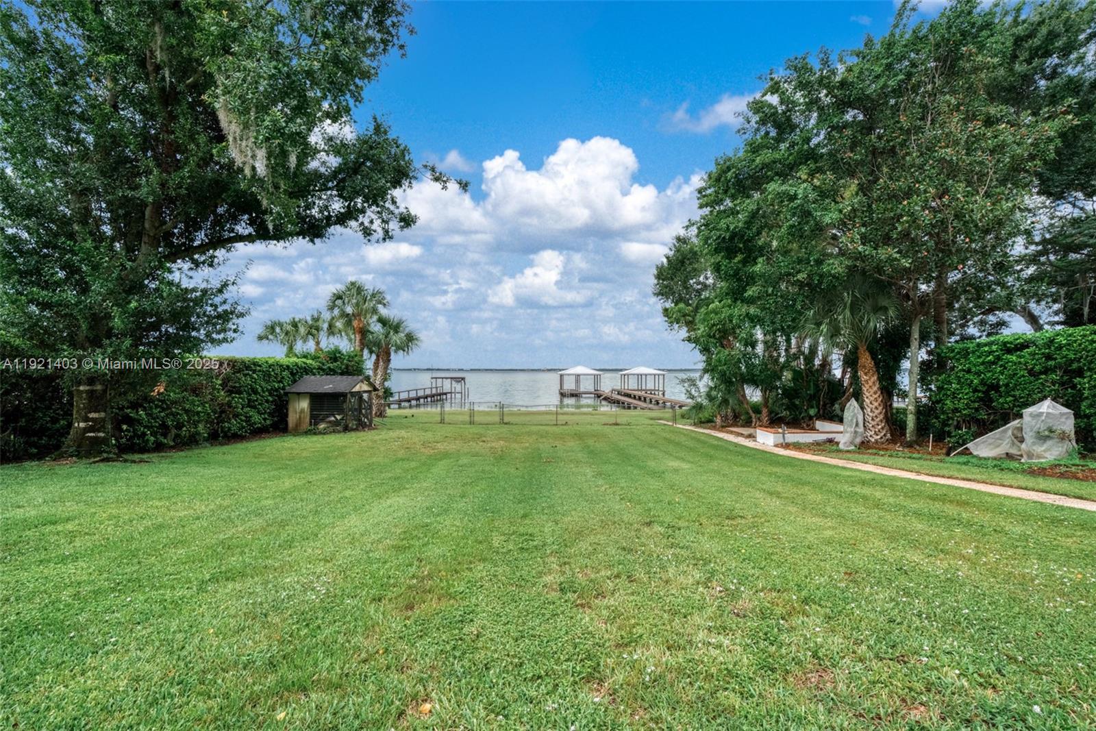 2551 Lakeview Drive Sebring, FL 33870 - Photo 71 of 73 a view of a house with a yard