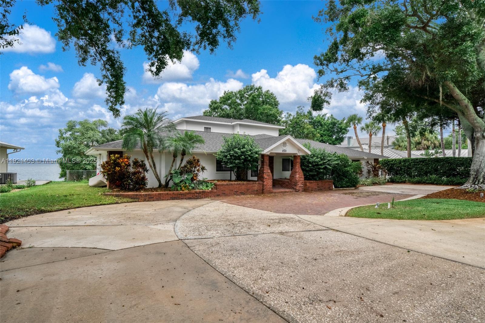 2551 Lakeview Drive Sebring, FL 33870 - Photo 73 of 73 a view of a house with a yard and tree s