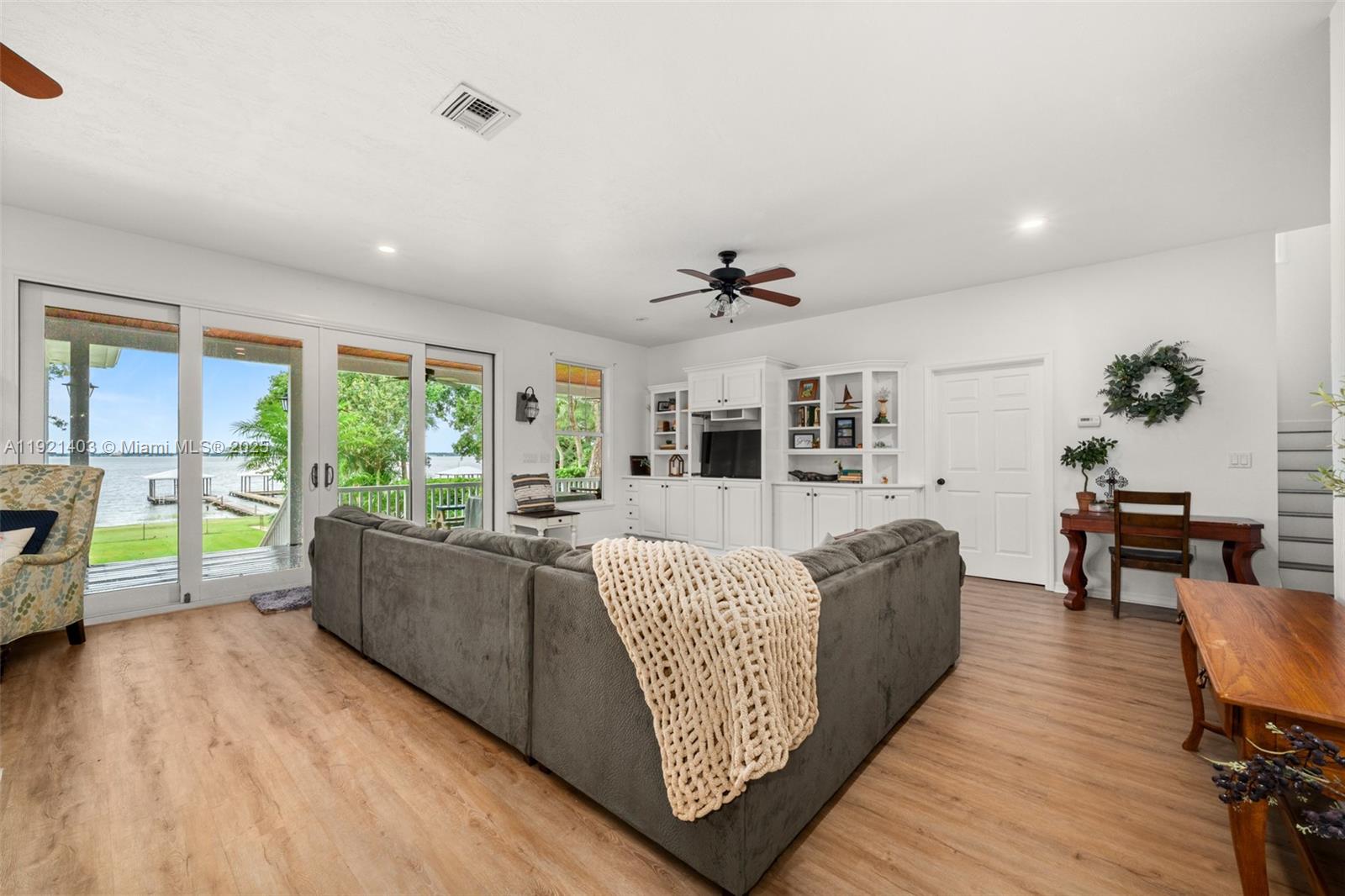 2551 Lakeview Drive Sebring, FL 33870 - Photo 8 of 73 a living room with furniture and a large window