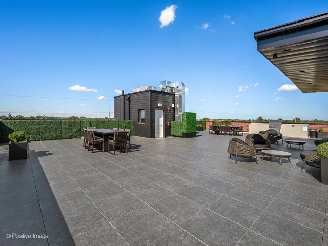 a view of a terrace with sitting area