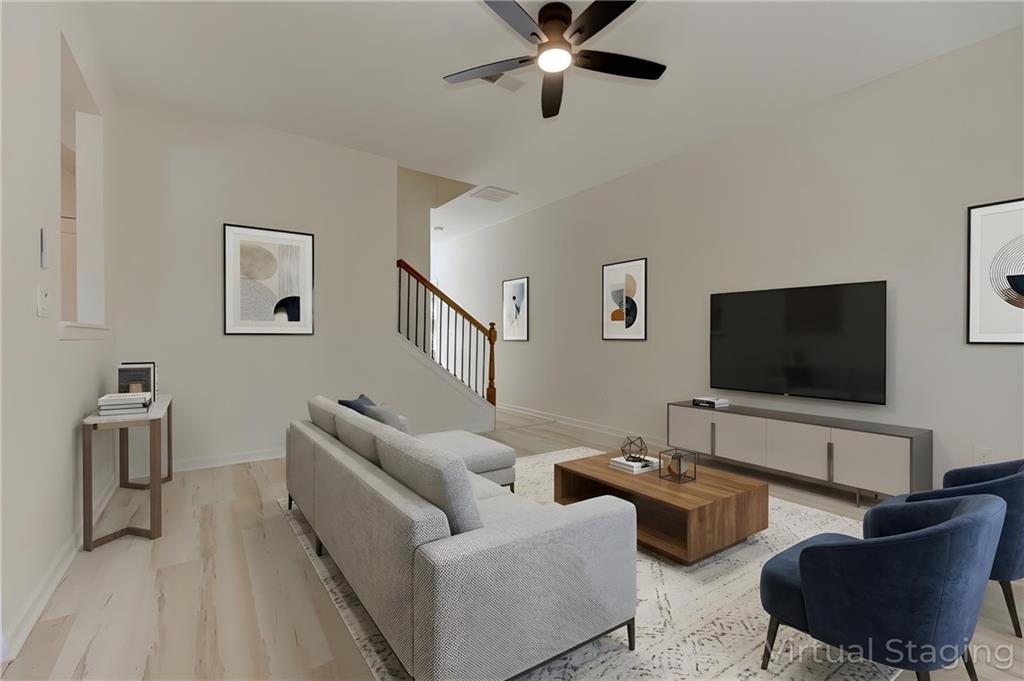 605 Summit Point Canton, GA 30114 - Photo 12 of 56 a living room with furniture and a flat screen tv