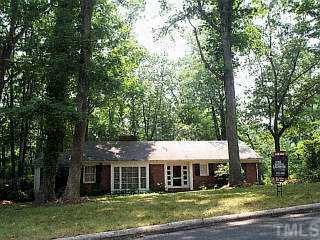 3127 Sussex Road Raleigh, NC 27607 - Photo 1 of 1 front view of a house with a yard