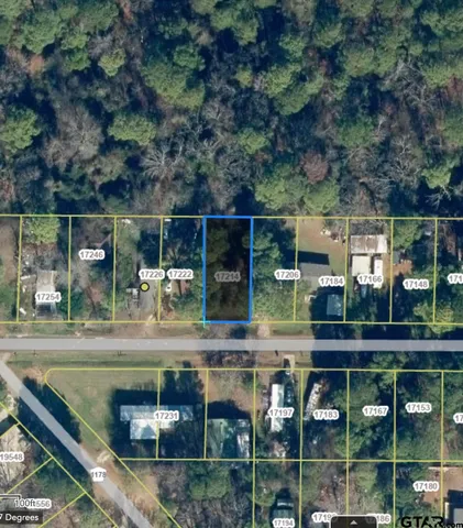 an aerial view of a house with swimming pool
