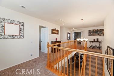 41606 Slice Way Temecula, CA 92591 - Photo 18 of 44 a view of a hallway with the kitchen