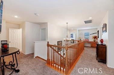 41606 Slice Way Temecula, CA 92591 - Photo 19 of 44 a living room with furniture and a wooden floor