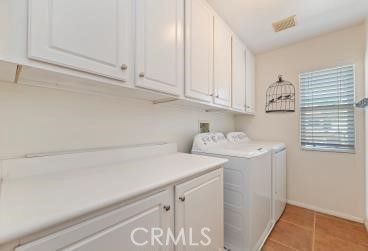 41606 Slice Way Temecula, CA 92591 - Photo 25 of 44 a view of storage and utility room with washer and dryer