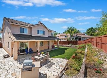 41606 Slice Way Temecula, CA 92591 - Photo 28 of 44 a front view of a house with garden