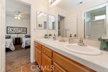 41606 Slice Way Temecula, CA 92591 - Photo 30 of 44 a bathroom with a sink double vanity and a mirror