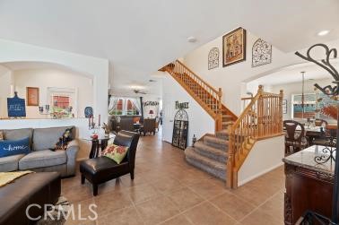 41606 Slice Way Temecula, CA 92591 - Photo 4 of 44 a living room with furniture and a dining table
