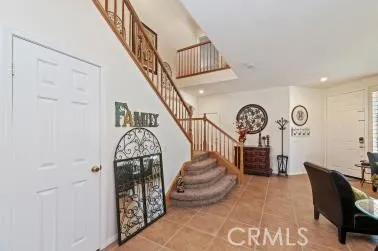 a view of entryway with stairs and furniture