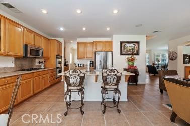 41606 Slice Way Temecula, CA 92591 - Photo 7 of 44 a view of a dining room with furniture