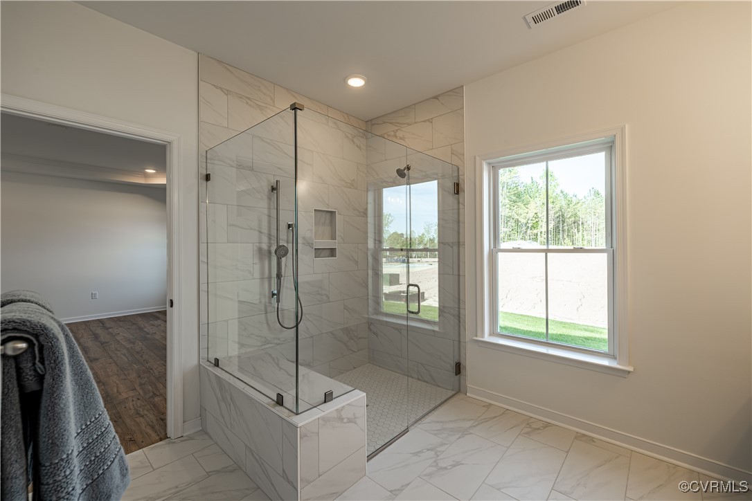 6649 Mayland Ridge Lane Moseley, VA 23120 - Photo 26 of 32 a bathroom with a shower